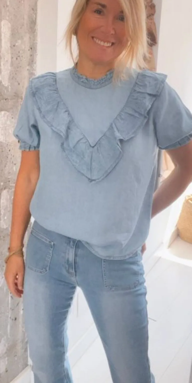Blusa azul claro volante